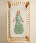 Infant wearing ergoPouch Sleep Sack 2.5 TOG in Willow