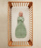 Infant wearing ergoPouch Sleep Sack in Willow