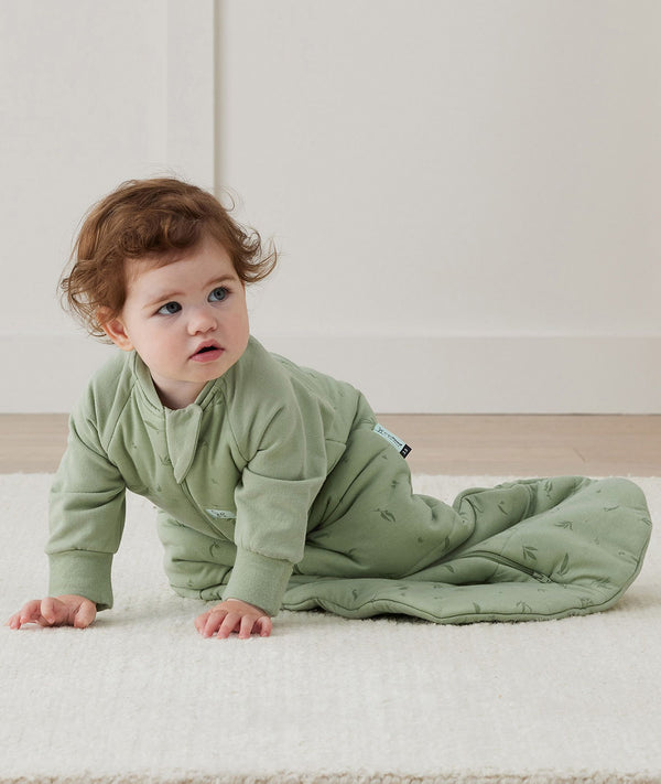 Infant wearing ergoPouch Sleep Sack in Willow