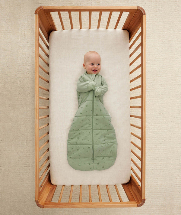 Baby wearing ergoPouch Sleep Sack 2.5 TOG Sleeved Willow