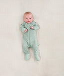 Newborn wearing an ergoPouch Long Sleeve Romper 1.0 TOG Sage