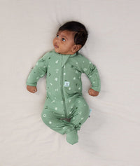 Baby lying in ergoPouch Long Sleeve Romper 1.0 TOG Sweet Orchard