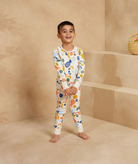 Preschooler wearing ergoPouch Long Sleeve Pajamas 1.0 TOG Fruit Salad
