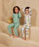 Smiling children wearing  long-sleeve-pyjamas-1-0-tog-fruit-salad and  Sweet Orchard