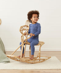 Kid playing in long-sleeve-pajamas-1-0-tog-night-sky