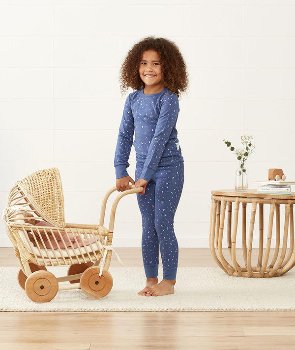 Kid playing in long-sleeve-pajamas-1-0-tog-night-sky