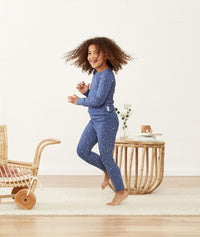 Kid playing in long-sleeve-pajamas-1-0-tog-night-sky