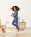 Kid playing in long-sleeve-pajamas-1-0-tog-night-sky
