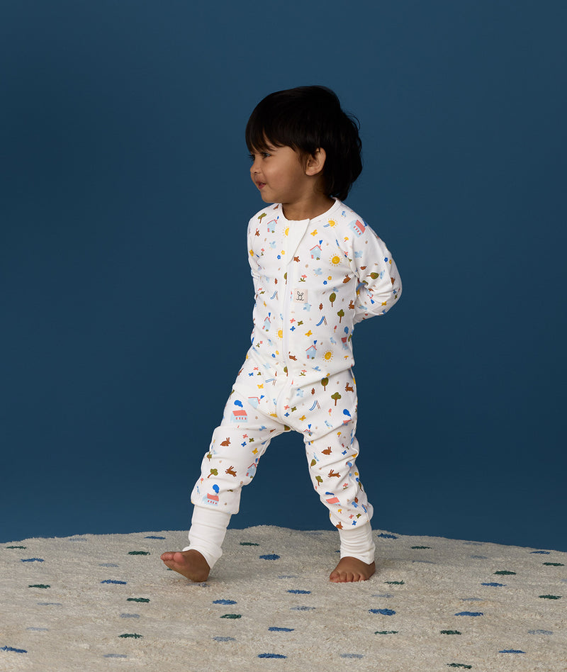 Toddler wearing ergoPouch Long Sleeve Romper 1.0 TOG Daydream