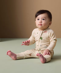 Infant in ergoPouch Long Sleeve Romper 1.0 TOG Savannah, sitting on the floor
