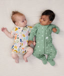 Two babies lying in ergoPouch Long Sleeve Romper 1.0 TOG Sweet Orchard and Fruit Salad