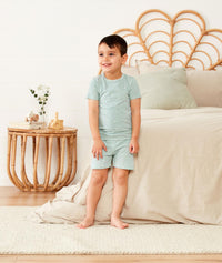 Preschooler wearing ergoPouch Short Sleeve Pajamas 0.2 TOG Sage