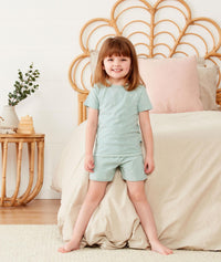 Toddler wearing ergoPouch Short Sleeve Pajamas in Sage