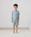 Kid wearing ergoPouch Short Sleeve Pajamas 0.2 TOG Dragonflies