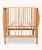 Side angle shot of the ergoPouch ellska Skye Crib