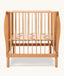 Side angle shot of the ergoPouch ellska Skye Crib