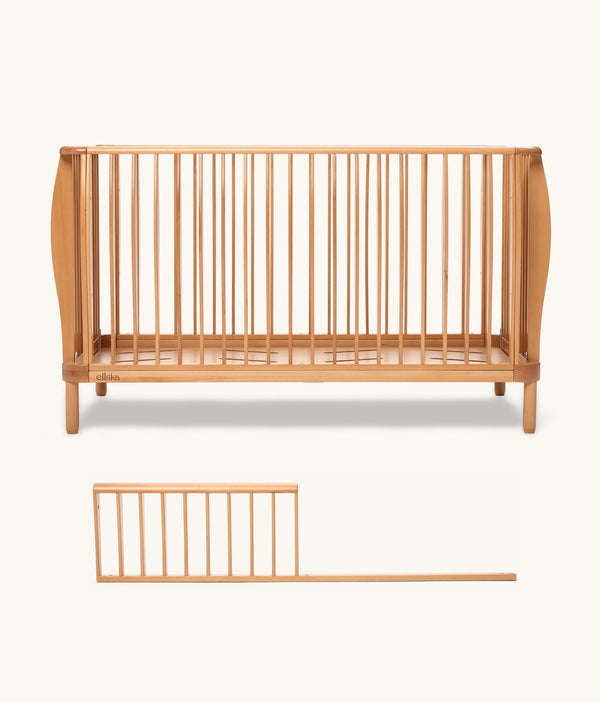 The ergoPouch Skye Toddler Conversion Bundle, including the ellska Skye Crib and the Skye Junior Sideguard, to grow with you
