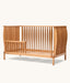 The ergoPouch ellska Skye Crib that has been converted into the Skye Junior Sideguard, to grow with you