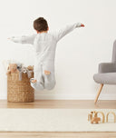 Child playing in ergoPouch Sleep Onesie 2.5 TOG Grey Marle, warm for the winter