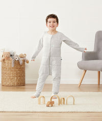 Preschooler wearing an ergoPouch Sleep Onesie 3.5 TOG Grey Marle