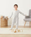Preschooler wearing an ergoPouch Sleep Onesie 3.5 TOG Grey Marle