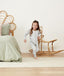 Child playing in ergoPouch Sleep Onesie 3.5 TOG Grey Marle, warm for the winter