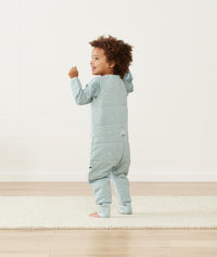 Toddler laughing in ergoPouch Sleep Onesie in Sage