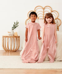 Preschooler wearing an ergoPouch Sleep Suit Sack 0.3 TOG Berries