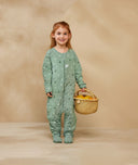 Child playing in ergoPouch Sleep Onesie 2.5 TOG Sweet Orchard, warm for the winter