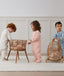Three children playing in ergoPouch Sleep Onesie 2.5 TOG Daisies Dragonflies, and Oatmeal Marle; warm for the winter