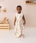 Toddler smiling wearing ergoPouch Jersey Sleep Suit Sack 0.2 TOG in Bon Appetit