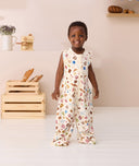 Toddler smiling wearing ergoPouch Jersey Sleep Suit Sack 0.2 TOG in Bon Appetit