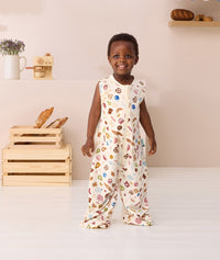 Toddler smiling wearing ergoPouch Jersey Sleep Suit Sack 0.2 TOG in Bon Appetit