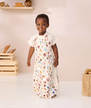 Toddler standing wearing ergoPouch Sleep Suit Sack 1.0 TOG in Bon Appetit