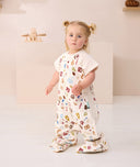 Toddler looking at the camera in ergoPouch Sleep Suit Sack 1.0 TOG in Bon Appetit