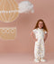 Toddler wearing an ergoPouch Sleep Suit Sack 1.0 TOG Daydream, a sleeping sack that converts to a sleep suit with legs by a four-way zipper feature. 