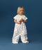 Toddler wearing an ergoPouch Sleep Suit Sack 1.0 TOG Daydream, a sleep sack that converts to a sleep suit with legs by a four-way zipper feature. 