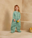 Preschooler wearing an ergoPouch Sleep Suit Sack 2.5 TOG Sweet Orchard