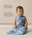Infant wearing a blue sleeveless Sleep Sack 1.0 TOG Dragonflies with text highlighting organic cotton and stretchy & bell-shaped design.