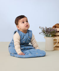 Infant wearing ergoPouch Sleeping Sack 2.5 TOG Petit Pretzel, a warm sleeping bag