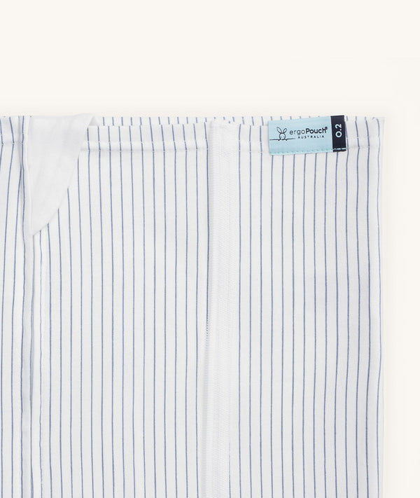 Close-up of ergoPouch HugMe Blanket in Midnight Stripe displaying the 0.2 TOG side