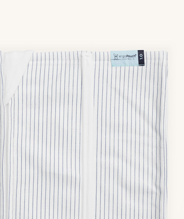 Close-up of ergoPouch HugMe Blanket in Midnight Stripe displaying the 1.0 TOG side