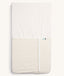 Product shot of zipped up ergoPouch HugMe Blanket in Caramel Grid