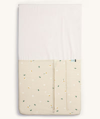 Product shot of an ergoPouch HugMe Blanket in Daisy Sprinkle with a closed zip