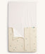 Product shot of an ergoPouch HugMe Blanket in Daisy Sprinkle