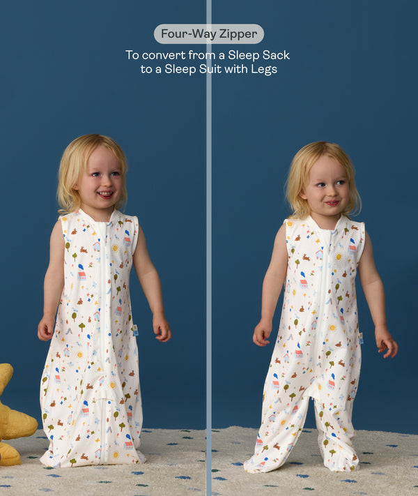 Child wearing an ergoPouch Jersey Sleep Suit Sack  0.2 TOG Daydream, a sleeping sack that converts to a sleep suit with legs