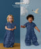 Two children wearing an ergoPouch Sleep Suit Sack 1.0 TOG Starbeam, a sleeping bag that converts to a sleep suit with legs by a four-way zipper feature. 