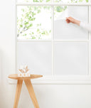 The easy application of peeling ergoPouch Window Blockout White from the window