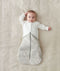 Baby lying a winter Sleeping Sack with added warmth with the Arm Warmers