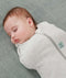 Baby swaddled in an ergoPouch Cocoon Swaddle Sack 0.2 TOG Grey Marle